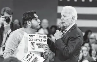  ?? Meg Kinnard / Associated Press file photo ?? A protester confronts then-presidenti­al hopeful Joe Biden in November 2019, objecting to his stance on deportatio­ns during a town hall at Lander University in Greenwood, S.C.