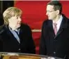  ??  ?? Premier Morawiecki und Kanzlerin Merkel. Foto: rtr