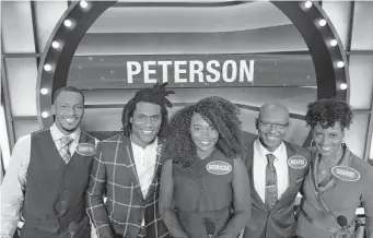  ?? “Family Feud” ?? The Petersons’ appearance on “Family Feud” airs Monday. Mom and team captain Sharri Peterson, right, started the process when she sent an audition video to the popular game show in July 2020.