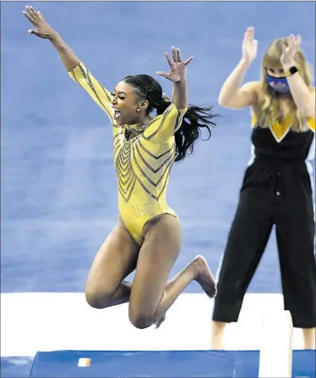  ?? Wally Skalij Los Angeles Times ?? NIA DENNIS, joyous after competing on the beam, used to feel alienated and discourage­d from the sport, but has grown “light years.”