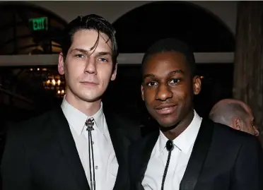  ??  ?? SONS OF THE LONE STAR STATE Musician Austin Jenkins, who helped launch Leon Bridges’ recording career, and Bridges at a music business reception in Los Angeles.