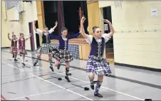  ?? SAM MACDONALD/THE NEWS ?? Several Highland dancers perform a sword dance on Sunday, in Pictou.