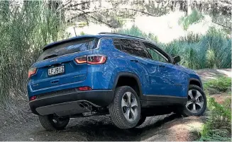  ??  ?? Yes it can. There is excellent traction and strength in off-road antics. And this isn’t even the tougher Trailhawk model.