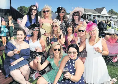  ??  ?? Fun in the sun Friends from Blairgowri­e, Coupar Angus, Newtyle and Meigle enjoyed ladies’day