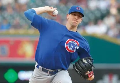  ?? PAUL SANCYA/AP ?? Cubs right-hander Kyle Hendricks allowed two runs and 10 hits in seven innings Tuesday night against the Tigers.