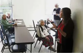  ?? — AP ?? Teaching the peace: Volunteer programme manager Kathy Blando talking to students during an anti-bullying class at the 30th Street Senior Center in San Francisco, California.