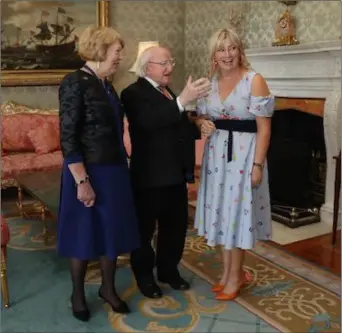  ??  ?? Proprietor of Ruby Rouge Niamh Byrne meets President Michael D Higgins and his wife Sabina Higgins.