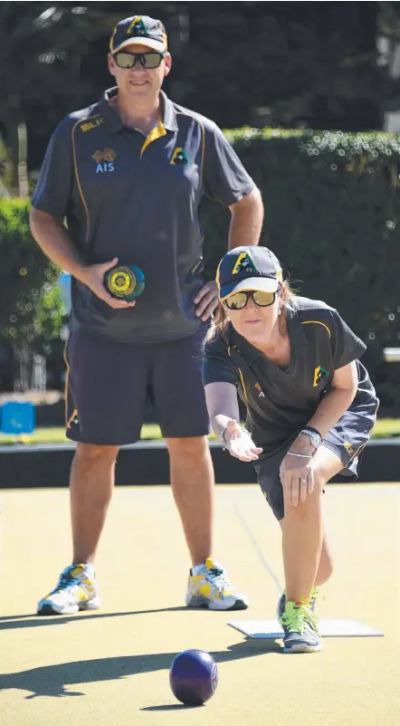  ?? Picture: STEVE HOLLAND ?? Brett Wilkie watches on as Lynsey Clarke gets in some practice before the Tests against England.