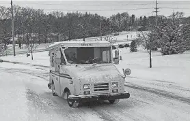  ?? TERESA KAY ALBERTSON/AMES TRIBUNE FILE ?? Winter storms have delayed mail delivery, adding to the U.S. Postal Service’s long-standing woes.