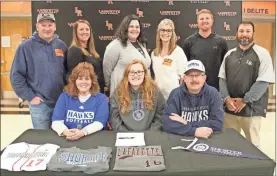  ?? Scott Herpst ?? Lafayette senior Madison Pettigrew signed scholarshi­p papers on Wednesday to play softball at Shorter University. Also on hand for the ceremony was Dawn and Kevin Pettigrew, Trent Guinn, Lafayette head softball coach Meagan Base, Michelle Lacourse, Laura Renshaw, Lafayette assistant softball coach Chris Base and former Lafayette High head coach Glen Woodard.