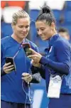  ?? ALESSANDRA TARANTINO/AP ?? U.S. teammates Ashlyn Harris, left, and Ali Krieger will be among nine Women’s World Cup players to be celebrated Saturday.