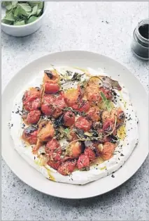  ?? Jonathan Lovekin Ten Speed Press ?? HOT, CHARRED cherry tomatoes with cold yogurt is in the seventh cookbook from the renowned British Israeli chef.