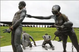  ?? BRYNN ANDERSON / AP ?? A new memorial to honor thousands of people killed in racist lynchings is on display at the National Memorial for Peace and Justice in Montgomery, Ala.