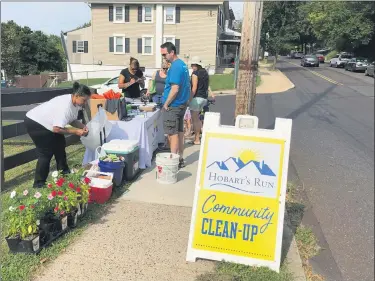  ?? SUBMITTED PHOTO ?? A plant sale undertaken outside the Ricketts Center by Hobart’s Run and Pottstown Community Action during a recent community cleanup.