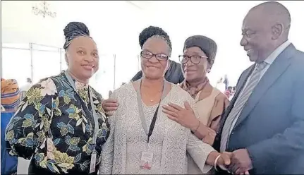  ?? ?? Masego Meremetsi and her mother Ipeleng Mazabane are congratula­ted by President Cyril Ramaphosa. Standing at the back is Dr Mawela, who also received an award. Picture: Supplied