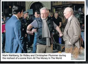  ??  ?? Mark Wahlberg, Sir Ridley and Christophe­r Plummer during the reshoot of a scene from All The Money In The World