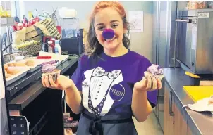  ??  ?? ●»SK Eight barista Aimee Neil prepares for the purple fun day