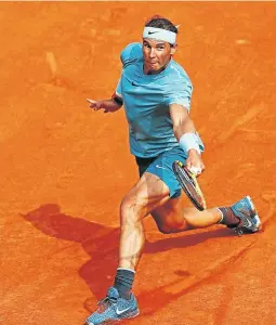  ?? /CLIVE BRUNSKILL/GETTY IMAGES ?? Rafael Nadal of Spain was relentless, brushing aside Dominic Thiem of Austria in the final.