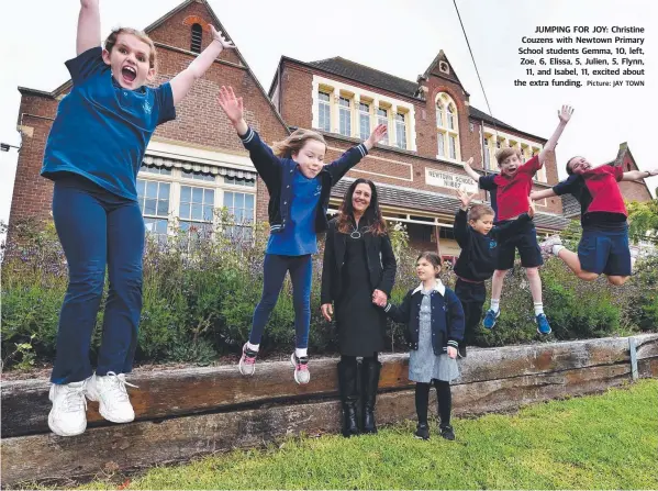  ?? Picture: JAY TOWN ?? JUMPING FOR JOY: Christine Couzens with Newtown Primary School students Gemma, 10, left, Zoe, 6, Elissa, 5, Julien, 5, Flynn, 11, and Isabel, 11, excited about the extra funding.