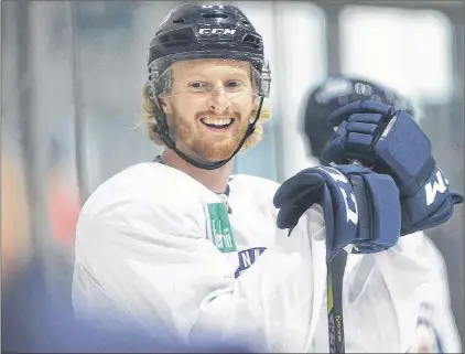  ?? AP PHOTO ?? Winnipeg Jets’ Kyle Connor smiles during a skating time trial during the first day of the Jets training camp in Winnipeg on Sept. 14.