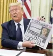  ?? AP ?? US PRESIDENT Donald Trump holds a copy of the New York Post, on Thursday, before signing an executive order to curb protection­s for social media giants. |