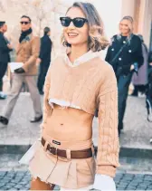  ?? SIMBARASHE CHA/THE NEW YORK TIMES ?? Jenny Walton in a Miu Miu skirt March 15 at the brand’s fall 2022 show in Paris.