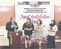  ??  ?? Stanley (left) speaks at the dinner. Also seen are newly installed presidents (from left) Shirley Wong, Jessica Chai and Herlina Ajaib Jamahari.