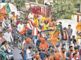  ?? PTI ?? BJP candidates celebrate after emerging victorious on the counting day of Gujarat municipal corporatio­n polls in Surat on Tuesday.