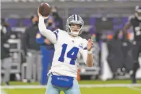  ?? GAIL BURTON/ASSOCIATED PRESS ?? Cowboys quarterbac­k Andy Dalton throws a pass against the Ravens during the first half of Tuesday’s game in Baltimore.