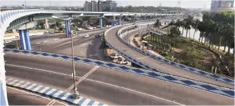  ?? PHOTOS: PTI ?? A view of deserted flyovers during lockdown in the wake of the COVID-19 pandemic, in Kolkata on Tuesday