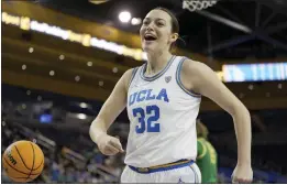  ?? JAE C. HONG — THE ASSOCIATED PRESS ?? UCLA's Angela Dugalic reacts after drawing a foul call against Oregon during the second half of Friday's game at Pauley Pavilion. Dugalic scored 17 points in the Bruins' win.
