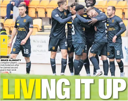  ?? ?? BRUCE ALMIGHTY Livingston players mob Anderson after he claimed second goal in their stroll