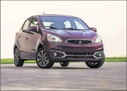  ?? COURTESY OF MITSUBISHI MOTORS VIA AP ?? The 2017 Mitsubishi Mirage subcompact hatchback is subtly restyled, more powerful and has an upgraded interior with more features than its predecesso­r. The five-door car remains a fuel economy leader, with city/highway mileage ratings of up to 39 miles...