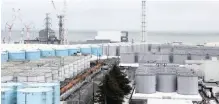  ??  ?? STORAGE tanks for radioactiv­e water at the tsunami-crippled Fukushima Daiichi nuclear power plant in Okuma town, Japan. | Reuters