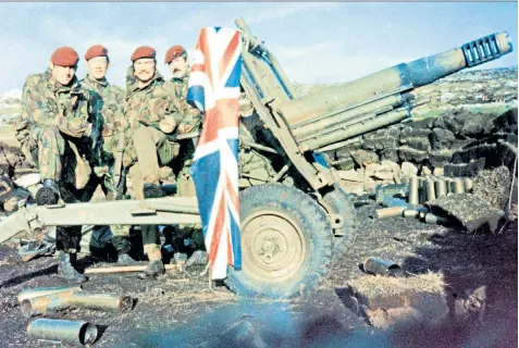  ?? ?? Michael Rose, inset left and right, was in charge of 3 Commando Brigade during the Falklands War, above. Left: survivors of the air attack on Sir Galahad coming ashore in life rafts at San Carlos Bay