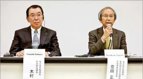 ?? BEHROUZ MEHRI/AFP ?? Nissan Motor’s board of directors’ chair Yasushi Kimura (left) and nomination committee chair Masakazu Toyoda attend a press conference to announce the company’s new CEO at its headquarte­rs in Yokohama on Tuesday.
