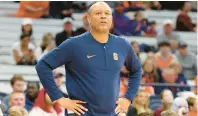 ?? BRYAN M. BENNETT/GETTY ?? Syracuse head coach Adrian Autry has taken over for Jim Boeheim, who retired after 47 years as coach.