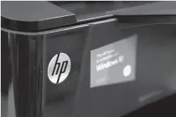  ?? ELISE AMENDOLA/ASSOCIATED PRESS ?? An HP printer is displayed at a store in North Andover, Mass. Like every year, small-business owners can count on changes in tax law.