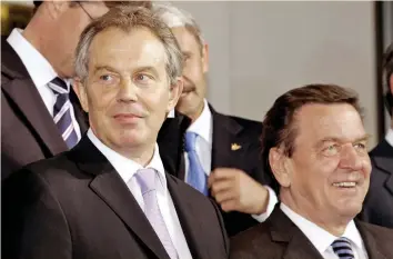  ?? (Gerard Cerles/Reuters) ?? THEN-BRITISH prime minister Tony Blair and then-German chancellor Gerhard Schroeder in 2005.