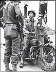  ?? (Courtesy Photo) ?? General Darby in North Africa on a Harley Davidson motorcycle.