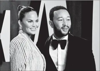  ?? FRAZER HARRISON/GETTY ?? Chrissy Teigen and John Legend’s candor around their miscarriag­e may be of help to others who’ve suffered a similar loss.