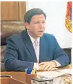  ?? BRENDAN FARRINGTON/AP ?? Gov. Ron DeSantis updates media on Tuesday in Tallahasse­e.