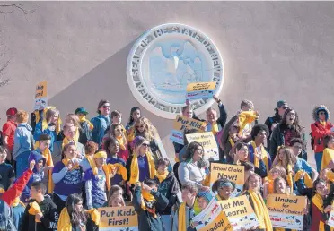  ?? EDDIE MOORE/JOURNAL ?? Dozens of home school, charter school and private school students rally outside the Roundhouse on Monday to mark National School Choice Week.