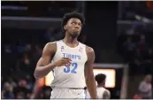  ?? KAREN PULFER FOCHT — THE ASSOCIATED PRESS ?? Memphis’ James Wiseman comes down court during the first half of an NCAA college basketball game against Illinois-Chicago on Nov. 8, 2019, in Memphis, Tenn.