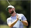  ?? CARLOS OSORIO — ASSOCIATED PRESS ?? Chris Kirk watches his drive on the 15th tee during the second round of the Rocket Mortgage Classic on Friday in Detroit.