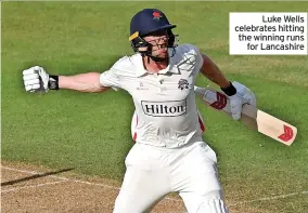  ?? ?? Luke Wells celebrates hitting the winning runs Sport for Lancashire