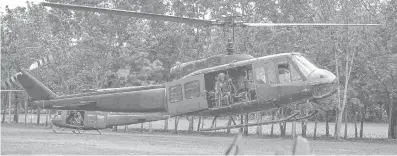  ?? ALDO NELBERT BANAYNAL ?? A Huey helicopter takes off to carry out a transport flight from the Camp Lapu-Lapu Central Command military base grounds in Barangay Lahug, Cebu City.