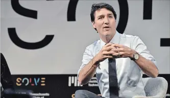  ?? PAUL MAROTTA
GETTY IMAGES FOR MIT SOLVE ?? Prime Minister Justin Trudeau was at MIT expounding on Canada’s push into artificial intelligen­ce.