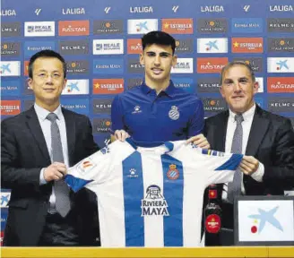  ?? // RCD ESPANYOL ?? Mao Ye, Rubén Sánchez y Fran Garagarza, durante la rueda de prensa de este lunes