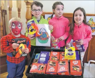  ?? Photograph Iain Ferguson, The Write Image. ?? Lucky young egg hunters, left to right, Kai Teressider and friends Fergus, Sophie and Mia Reid after searching the gardens of the Moorings Hotel for chocolate goodies.